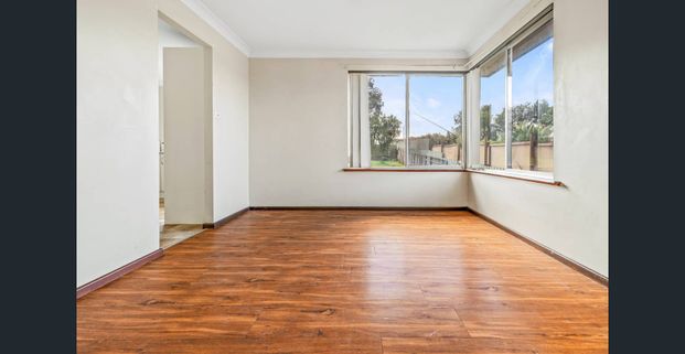 Great-Sized Three-Bedroom Home with Country Feel - Photo 1