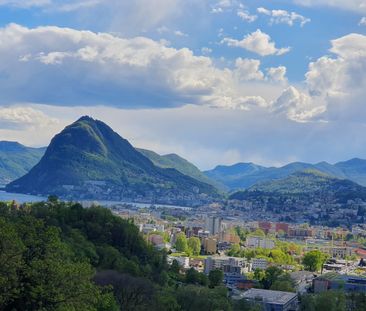 Il lusso sulle acque: Appartamento con vista sul Lago di Lugano - Foto 3