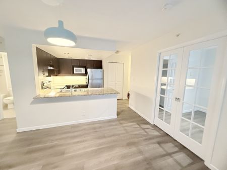 Spacious and Bright Two Bedroom Home in Serene Burnaby Mountain By SFU - Photo 4