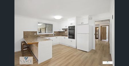 This charming, partly renovated 3-bedroom, 2-bathroom home perfectly blends modern updates with classic comfort. - Photo 3