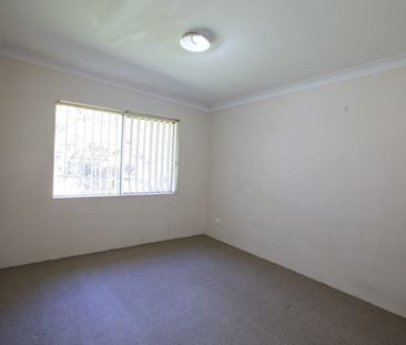 Two Bedroom Unit with Air Conditioner & Garage - Photo 1