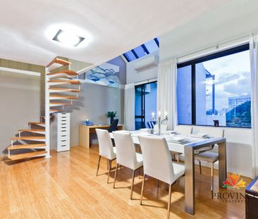 A RARE FIND! New York Style 2 Storey Apartment | with 2 Car Bays! - Photo 5