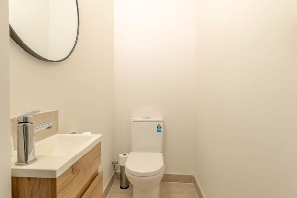 Spacious Family Living with Modern Comforts and Superb Location - Photo 1