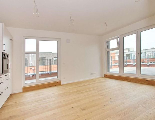 Spreeduett - Dachgeschoss mit 32 qm Terrasse, EBK und Duschbad im Erstbezug - Foto 1