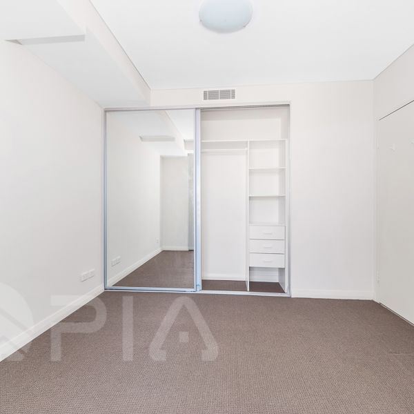 Entry via Block C,As new 1-bedroom modern apartment now for lease - Photo 1