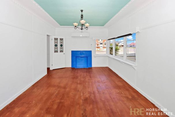 Neat & Comfortable 3-Bedroom Home Close to Town - Photo 1