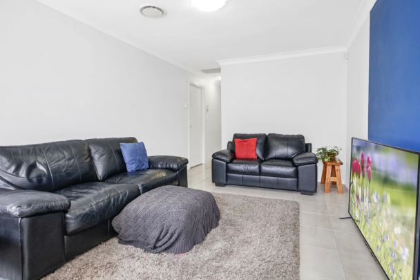 Immaculate and Convenient Two Bedroom Villa - Photo 1