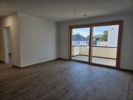 *EXKLUSIVE 2 ZIMMER-WOHNUNG mit EBK *AUFZUG *TIEFGARAGE * BARRIEREFREI *ERSTBEZUG - Photo 2