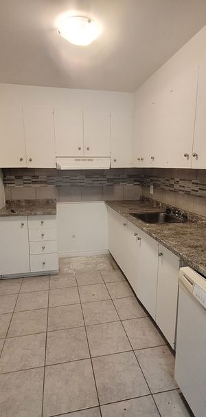 Beau 4 1/2 Situé Au Rez-de-jardin - Photo 1