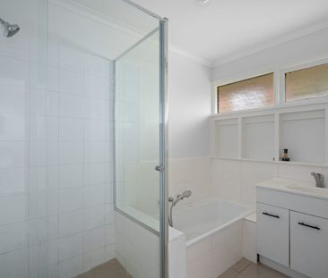 Spacious 3-Bedroom Unit in Prime Location - Photo 6