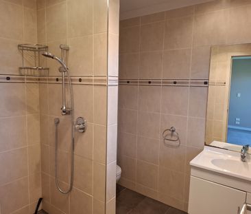 Discover comfort and convenience in this four-bedroom, two-bathroom... - Photo 1