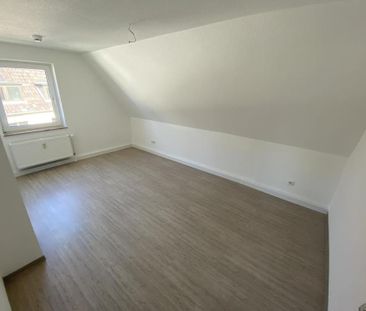 Einziehen und Wohlfühlen: Freundliche 3-Zimmer-Wohnung im Dachgeschoss - Foto 6