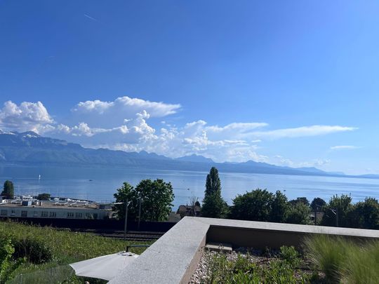 Appartement moderne de 2.5 pièces avec vue exceptionnelle sur le lac et les montagnes - Photo 1