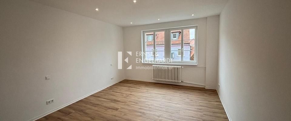 Frisch renovierte, lichtdurchflutete 2-Zimmer-Wohnung mit Dachterrasse in zentraler Lage (2. OG) - Foto 1