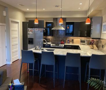 Three-story Townhouse close to UofA and University Hospital — 1 Bedroom+ Den Townhouse - Photo 1