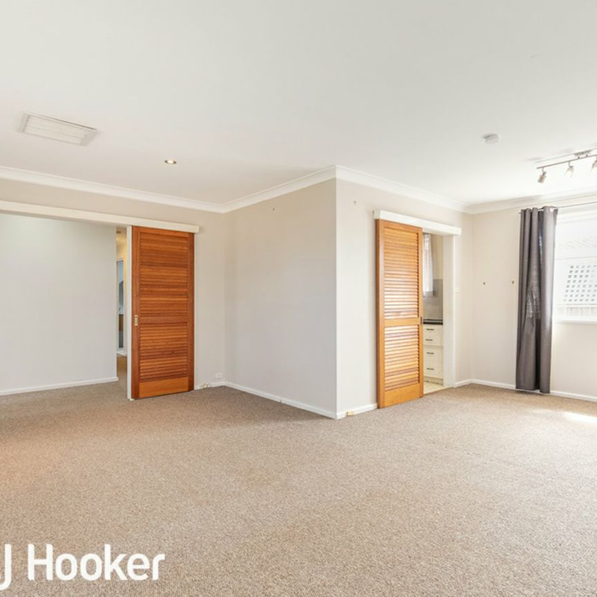 Comfortable Family Home with Renovated Bathroom - Photo 1