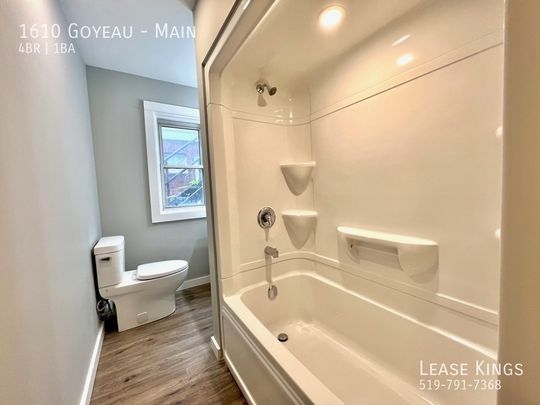 Completely Renovated 4 Bedroom 1 Bathroom Main Floor Unit - Photo 1