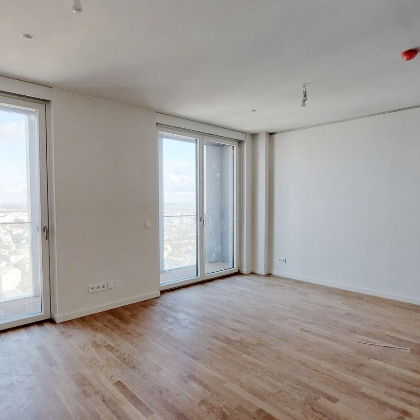 Urbanes Wohnen mit Rooftop Pool, Spa & Skylineblick – TOWER HOMES im V22 - Photo 1