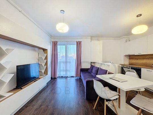 Apartament modern cu 2 camere, garaj, balcon, aproape de Iul - Photo 1
