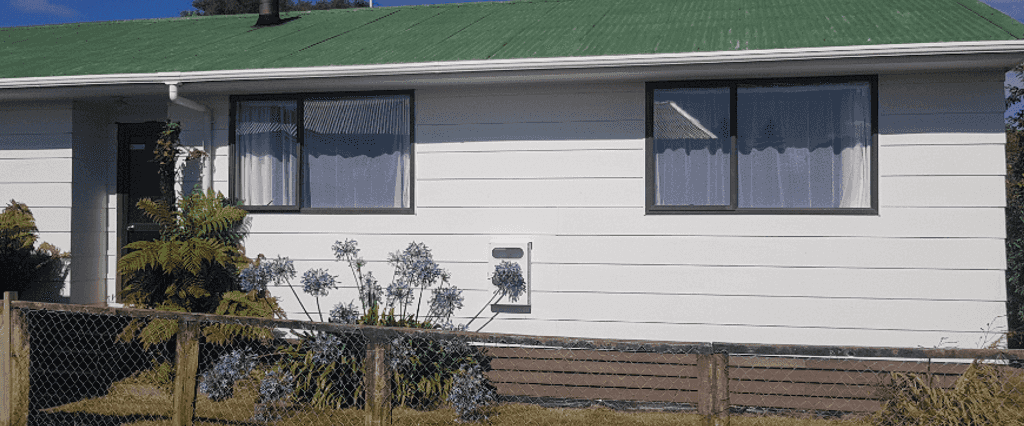 Practical and Cozy 3-Bedroom Home with Garage - Photo 1