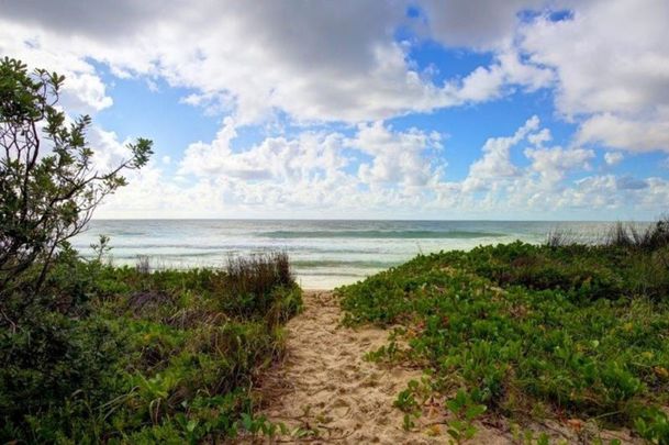 Modern living close to shops & beaches - Photo 1