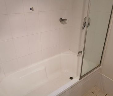 SPACIOUS FURNISHED 2 BED 2 BATH APARTMENT WITH PRIVATE YARD - Photo 2