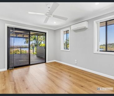 Spacious Family Living with Stunning Water & Hinterland Views - Photo 6