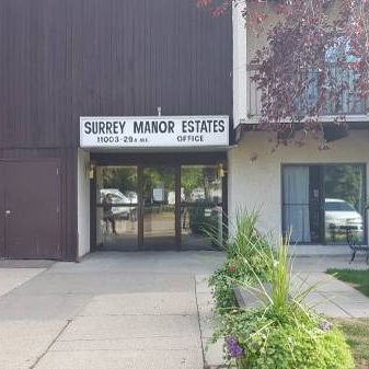 SURREY MANOR - 1 & 2 Bedroom Suites - Photo 4