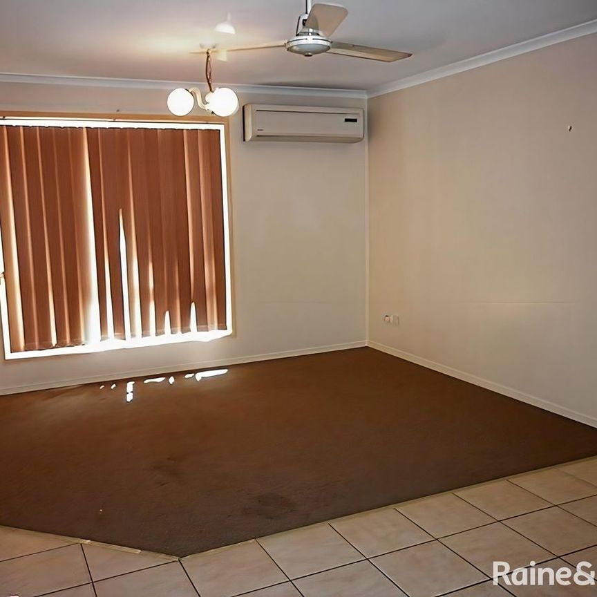 LOW SET FULLY FENCED FAMILY BRICK HOME - Photo 1