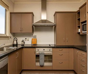 Fully Furnished Two Bedrooms in Town - Photo 1