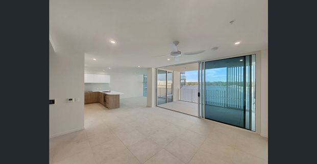 BRAND NEW LUXURY APARTMENT LIVING IN THE HEART OF BARINGA | RESORT STYLE FACILITIES! - Photo 1