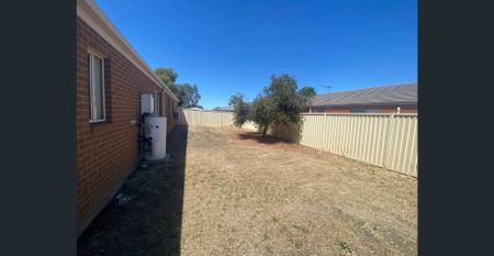 4 Bedroom Family-Friendly Home with Open Living Space - Photo 3