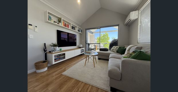 Fully Furnished Urban Retreat | Modern 2x2 Living in a Premier Lifestyle Location - Photo 1