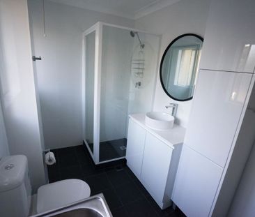 Modern 2 bedroom unit in Prime CBD location - Photo 2