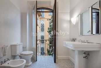 Spacious renovated apartment with balconies in a historic building