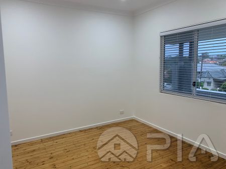 Renovated New Three bedroom home - Photo 2