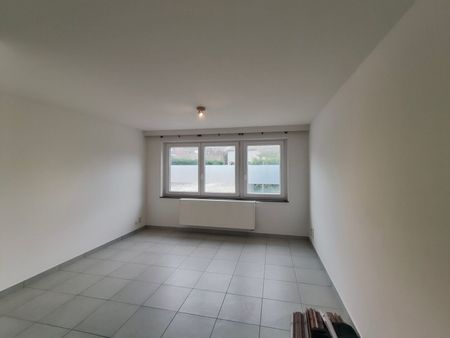 Gelijkvloers app. met 1 slaapkamer en autostaanplaats! - Photo 5