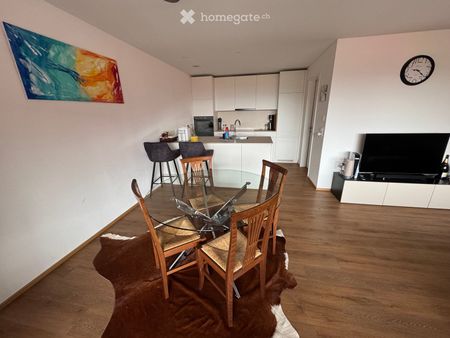 Charmante 2.5-Zimmer-Wohnung mit grosser Terrasse und Garagenparkplatz - Foto 2