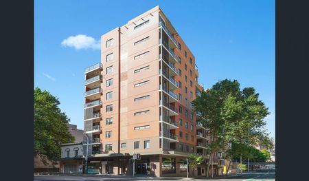 PARTIALLY FURNISHED APARTMENT IN ULTRA CONVENIENT LOCATION - Photo 3