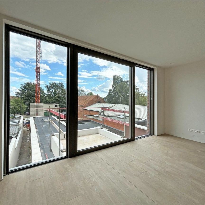 Nieuw 2 slaapkamer appartement met ruim terras in het centrum van Schoten! - Foto 1