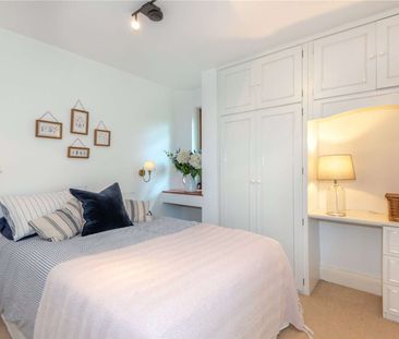 Situated in one of the most sought after roads in Englefield Green,... - Photo 1