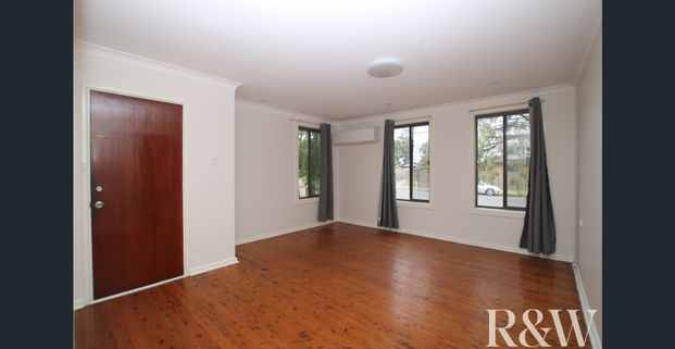 Freshly Painted Four Bedroom Home - Photo 1