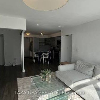 Feels brand new entertainment district + den parking included! - Photo 3