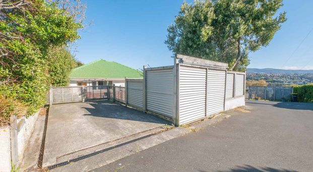 Sunny, Low-Maintenance Home and Ample Parking - Photo 1