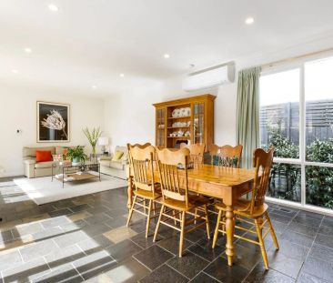 CHARMING VICTORIAN-INSPIRED HOME IN A BRIGHT, LOW MAINTENANCE GARDE... - Photo 1