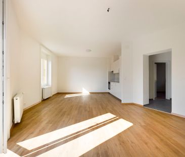 CENTRAL 3.5-ROOM APARTMENT ON THE 2ND FLOOR WITH BALCONY - Photo 1