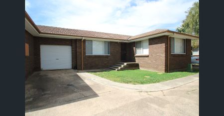 Functional and Low Maintenance Unit - Photo 2