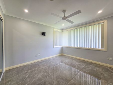 Stylish & Modern Family Retreat with Pool & Solar - Prime Campbelltown Location! - Photo 5