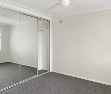 Beautifully Renovated 3-Bedroom Home - Photo 6