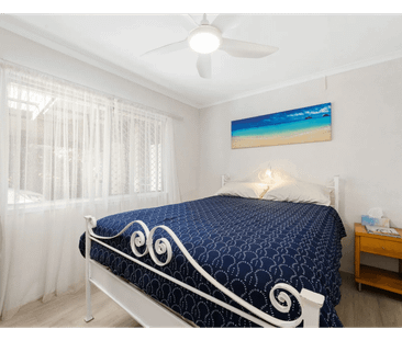 Properly Managed l Coastal Convenience Meets Comfortable Living - Photo 2